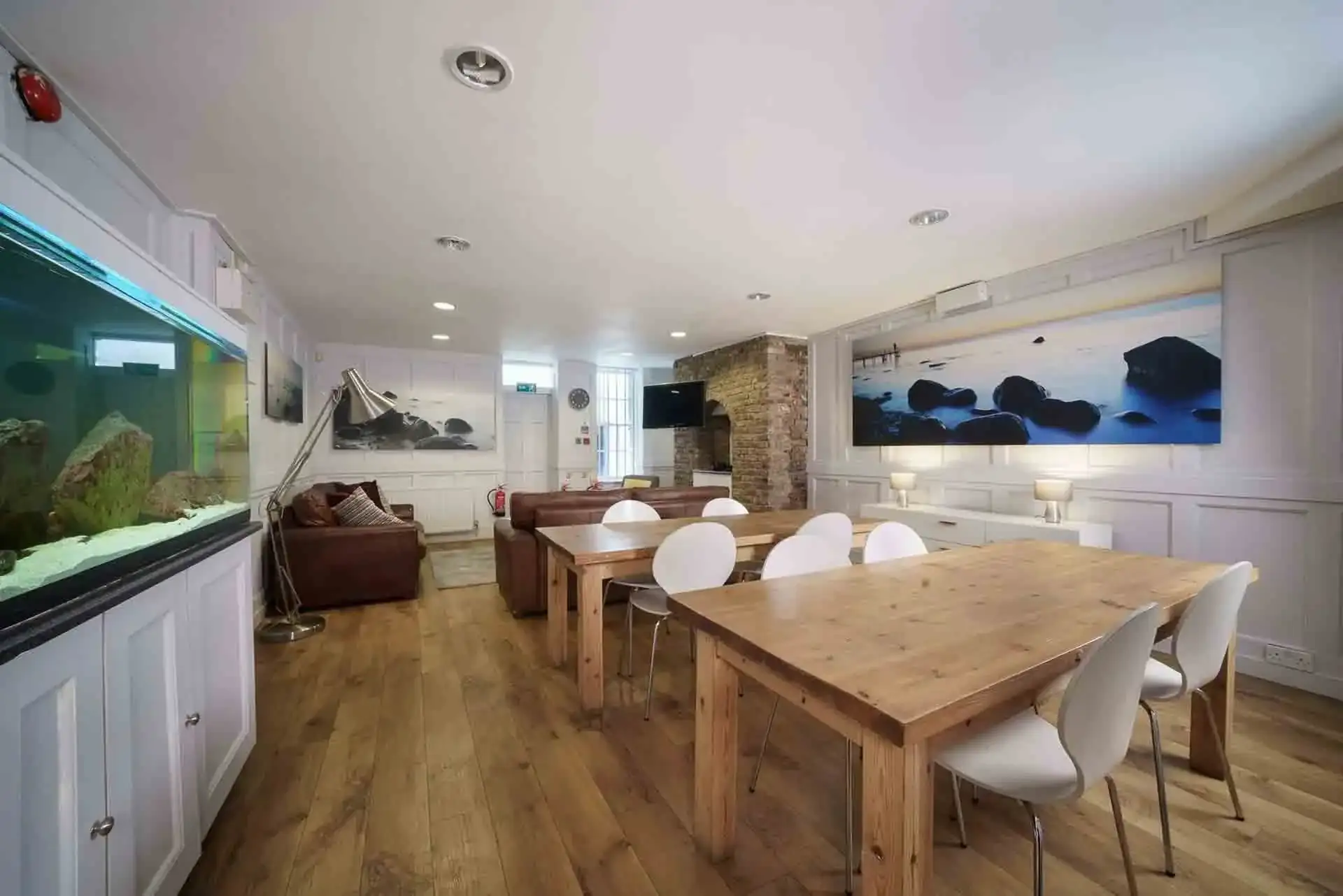 Green room with sofas, makeup station and wardrobe rail at Mount Pleasant Studio